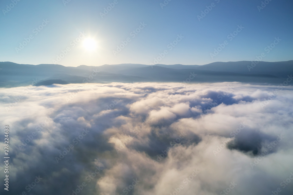 Aerial view white clouds in blue sky at morning. Aerial view white clouds in blue sky at morning.