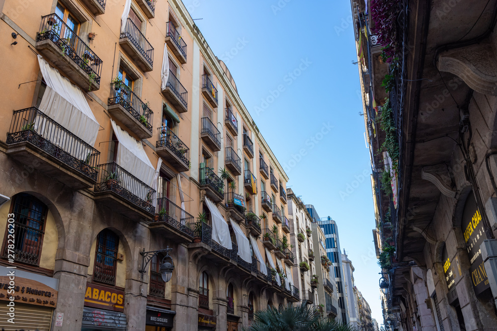 Narrow ancient city street in  Barcelona.