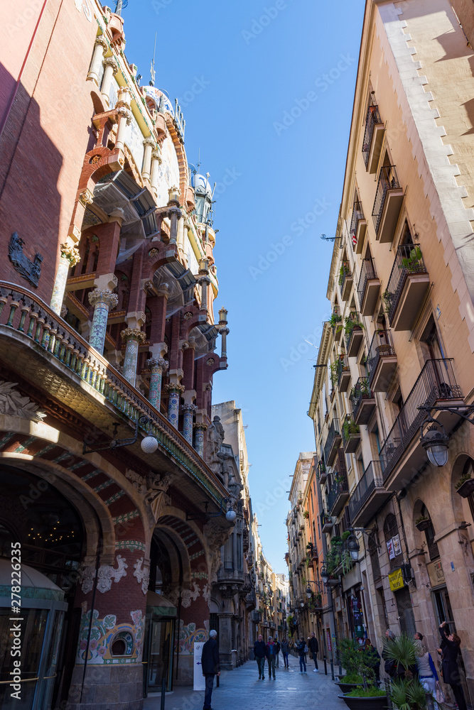 Narrow ancient city street in  Barcelona.