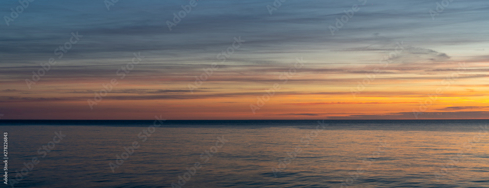 Etretat, France - 05 31 2019: sunset over the sea of Etretat