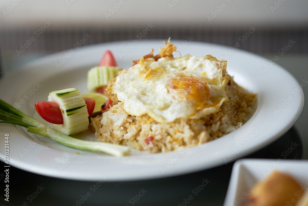 street fried rice with fried egg on top