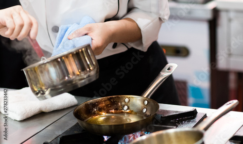 Chef cooking food in the kitchen, Chef preparing food