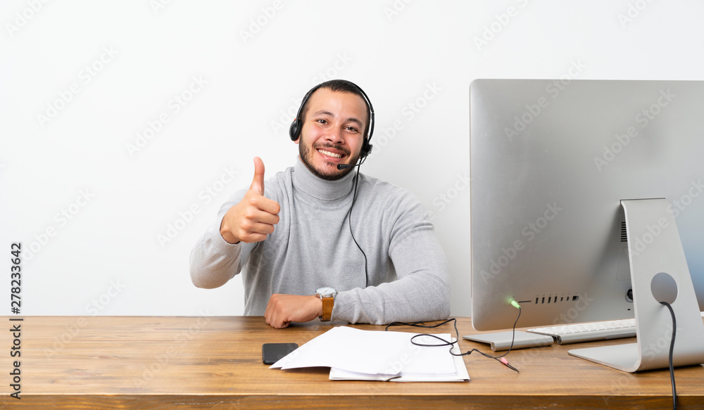 Telemarketer Colombian man with thumbs up because something good has happened Telemarketer Colombian man with thumbs up because something good has happened