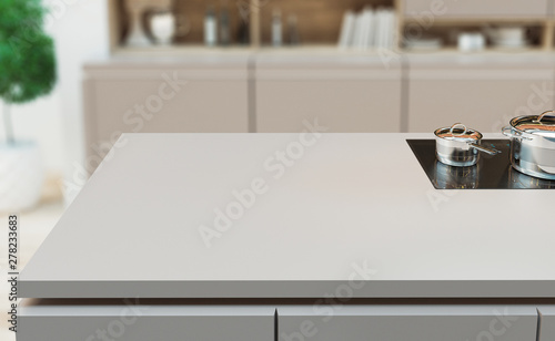 Wooden table over blurred k...