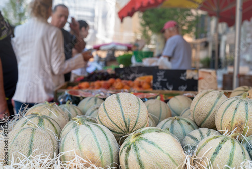 Regional cavaillon melon on the street market provencal, Aix-en-Provence, France photo