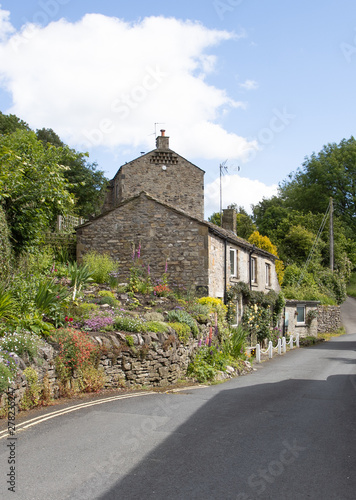 Hillside cottage with cottage garden in Yorkshire Dales