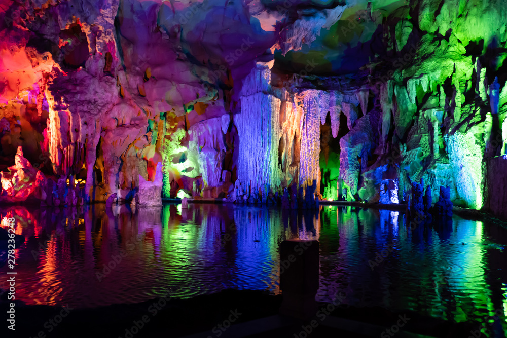 Fototapeta premium Nice cave with stone pattern formed by nature, stalactites, stalagmites, karst limestone