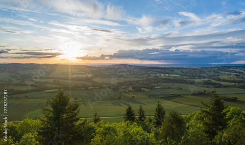 Dramatic Sunset Clouds over Scenic Valley in Shropshire, UK