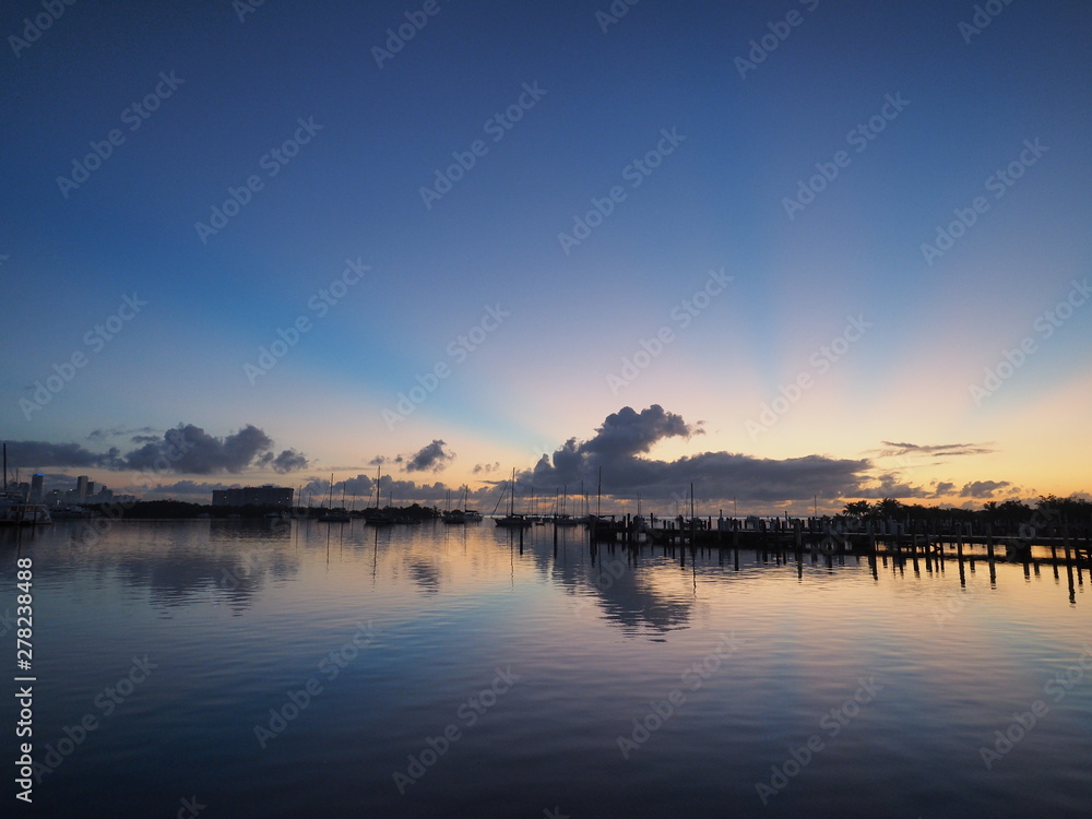 Sunrise over Dinner Key Marina in Coconut Grove, Miami, Florida. Sunrise over Dinner Key Marina in Coconut Grove, Miami, Florida.