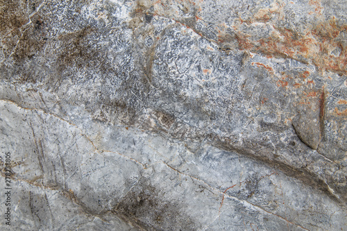 Cave wall/Surface of a cave/Stone surface/Stone background texture. photo