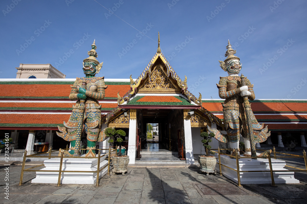 Giant Demon Guardian Standing in  Front of Wat Phra Kaew (Grand Palace) Door in Bangkok Thailand