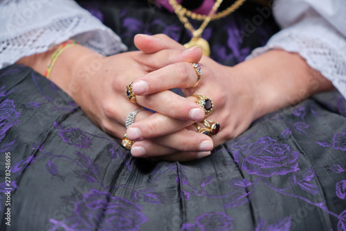 Obraz na plátně A woman dressed in typical Sardinian costume with different Sardinian ornamental golden jewels