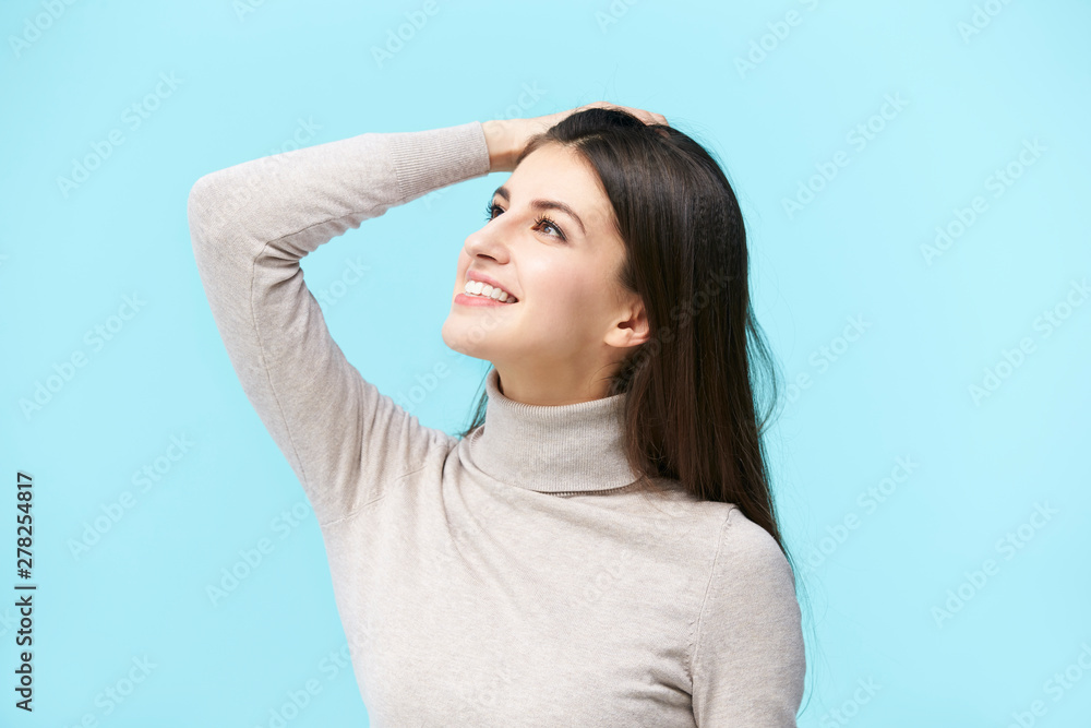 young caucasian woman looking up and smiling young caucasian woman looking up and smiling
