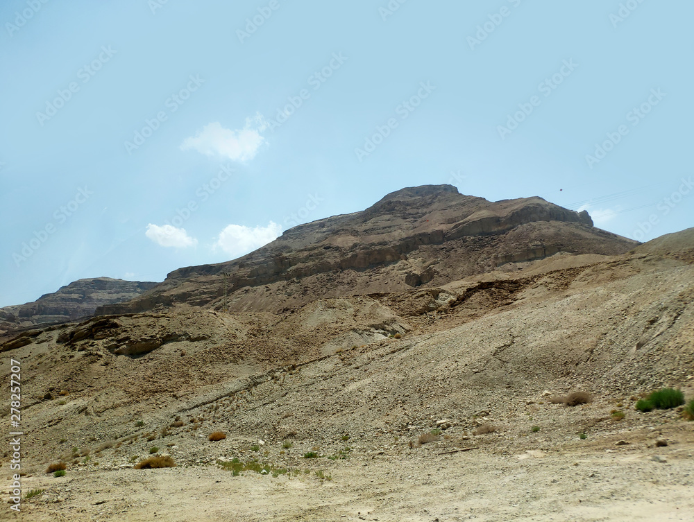 Desert land landscape with rocks, hills and mountains