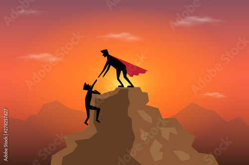 Businessman holding partner s hand on climbing to top
