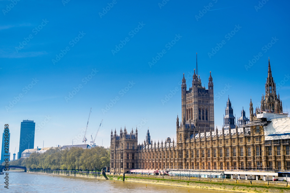 British Parliament along the River Thames in London, UK.