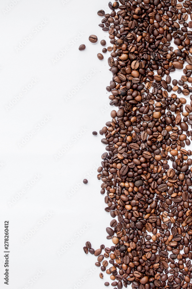 Coffee beans isolated on white background with copyspace for text. Coffee background or texture concept Coffee beans isolated on white background with copyspace for text. Coffee background or texture concept