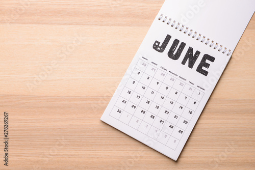 Flip paper calendar on wood...