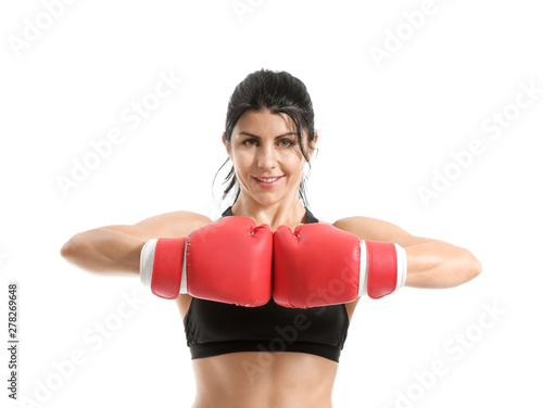 Sporty female boxer on white background © Pixel-Shot
