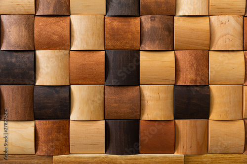 mosaic of wood closeup, wall decoration. Modern design, natural wood texture