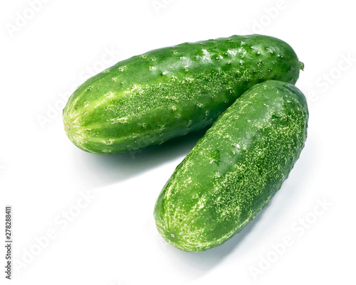 two open grounded green cucumbers close-up isolated on white background with shadow