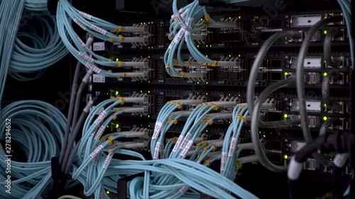Servers racks close up in Modern data center. Cloud computing datacenter server room.