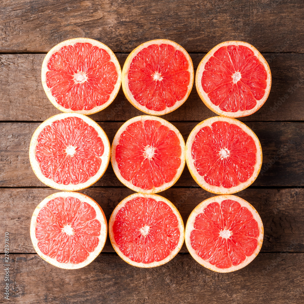 Fresh grapefruits on wooden table. Top view Fresh grapefruits on wooden table. Top view