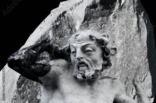 Bild auf Leinwand Ancient statue of Sisyphus with stone