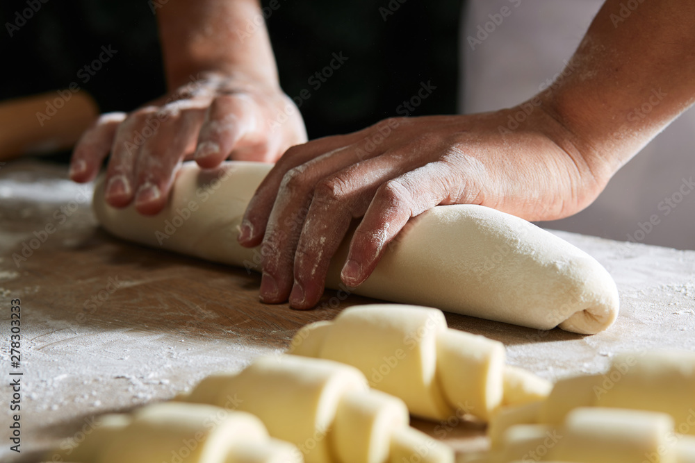 The process of making cantonese bread by hand is done in a sunshine making workshop The process of making cantonese bread by hand is done in a sunshine making workshop