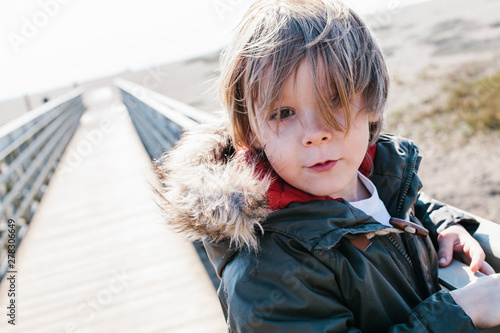 Portrait of a boy with a winter coat on photo