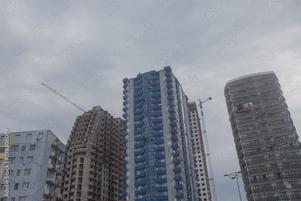 Construction of the new multi-storey building. Modern civil engineering Construction of the new multi-storey building. Modern civil engineering