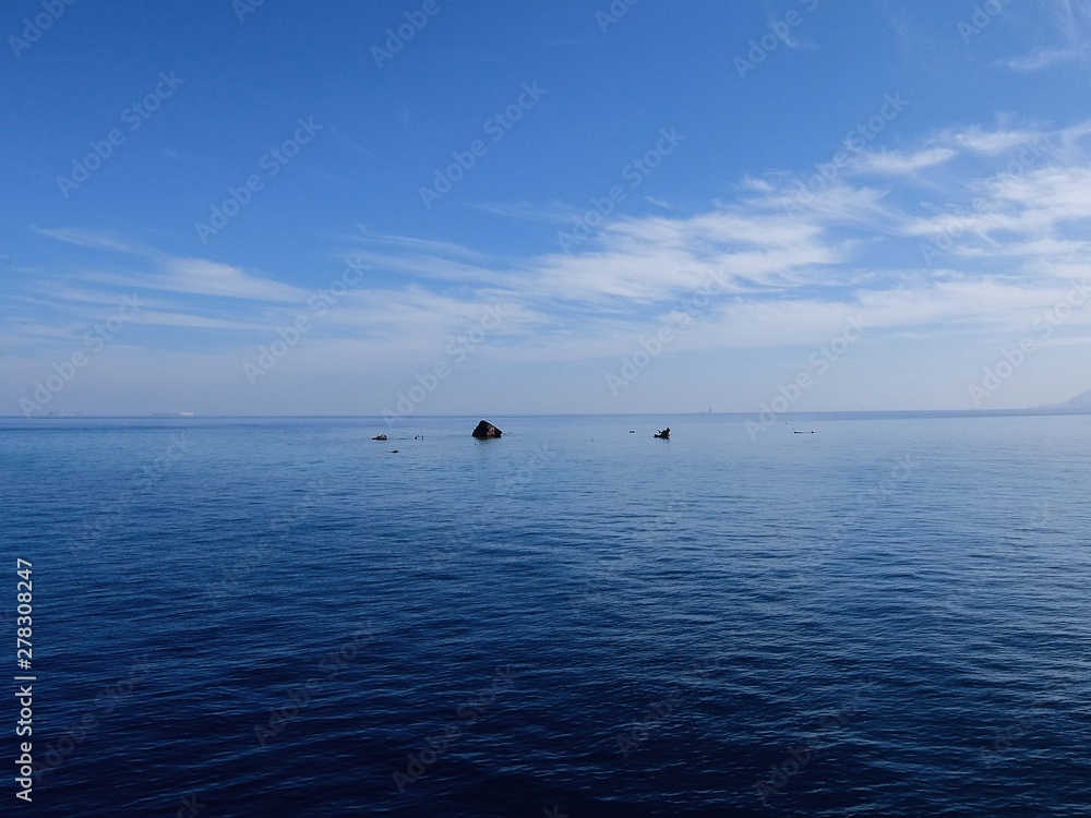 A section of a sunken ship sticks out of the water at Abu Nuhas in the Red Sea, Egypt A section of a sunken ship sticks out of the water at Abu Nuhas in the Red Sea, Egypt