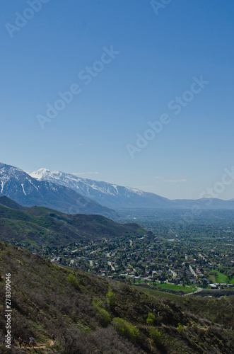 A view of the clear blue sky above the utah valley in summer.  photo