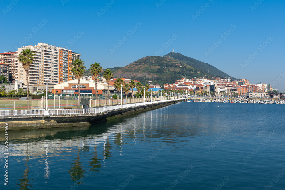 Panorama of Santurtzi with Serantes mountain as background from Iron Pier of Portugalete, Basque Country, Spain
