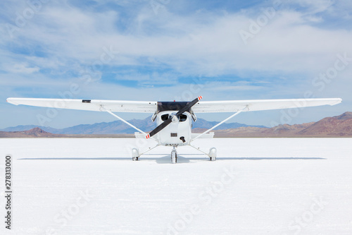 Single engine airplane parked on Bonneville Salt Flats, Utah