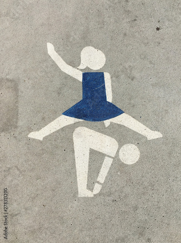 playful sign on concrete floor