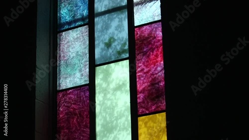 Tilt down, stained glass windows in church