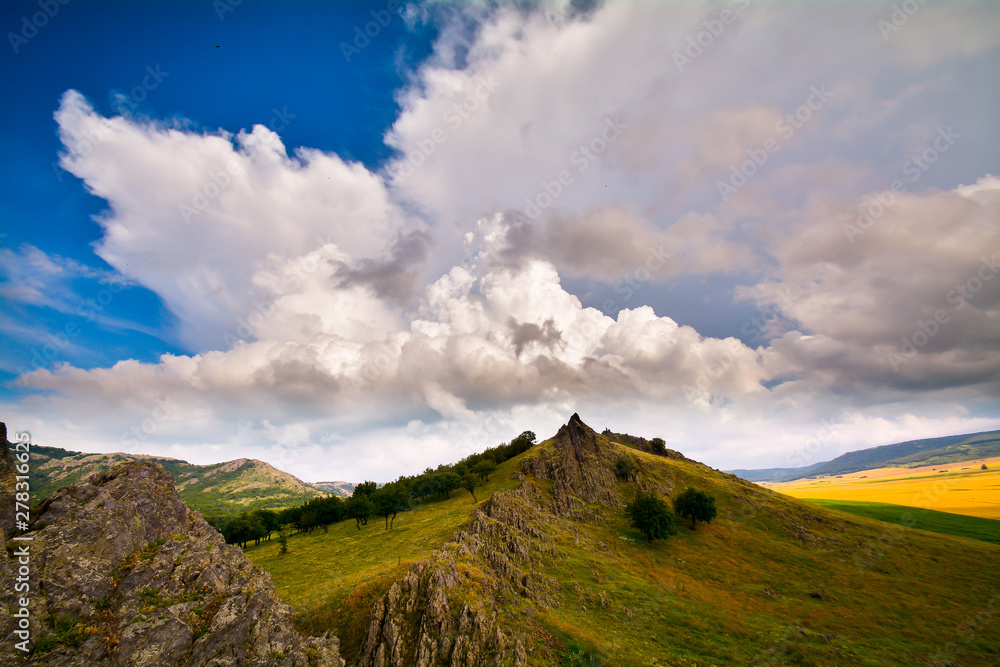 mountain landscape with beautiful sky in Dobrogea, Romania