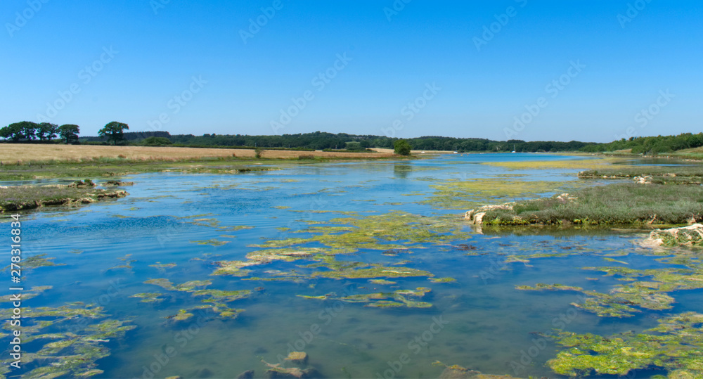 landscape with lake and blue sky landscape with lake and blue sky