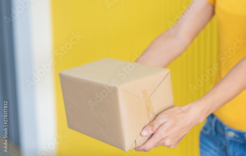 people holding parcel and giving to customer, Online shopping concept © Supagrit Ninkaesorn