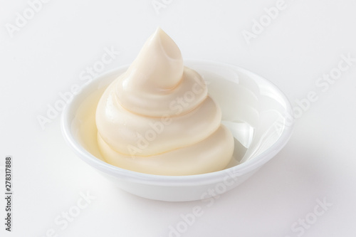 mayonnaise in a dish isolated white background