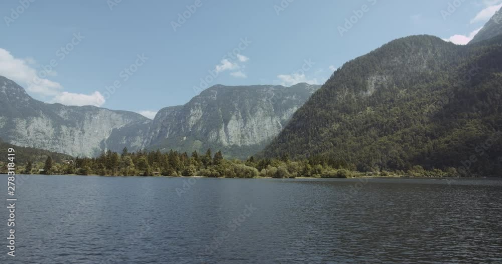 Small water ripples in a natural lake near the Austrian town of Obertraun. Small water ripples in a natural lake near the Austrian town of Obertraun.