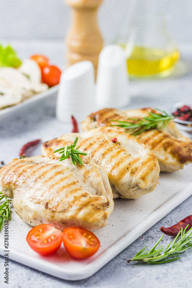 Feta spinach tomatoes stuffed chicken fellet, grilled. Selective focus, space for text. Feta spinach tomatoes stuffed chicken fellet, grilled. Selective focus, space for text.