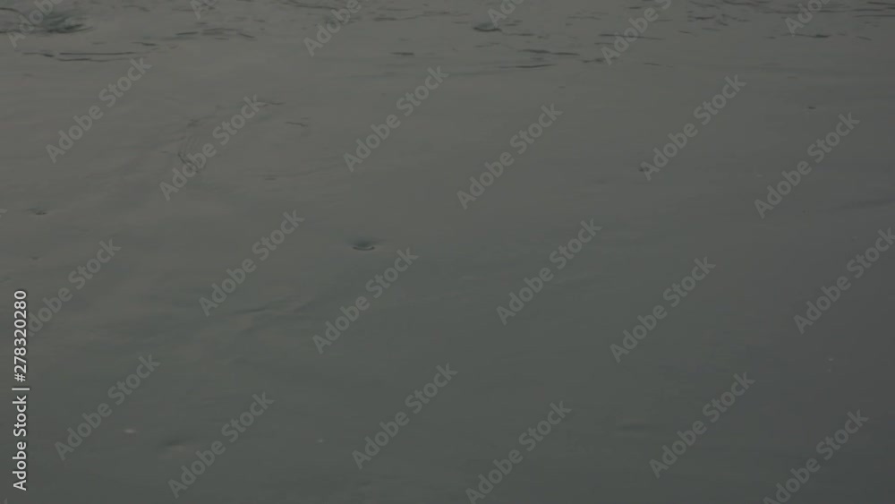 slow motion grey glassy water flowing slow motion grey glassy water flowing