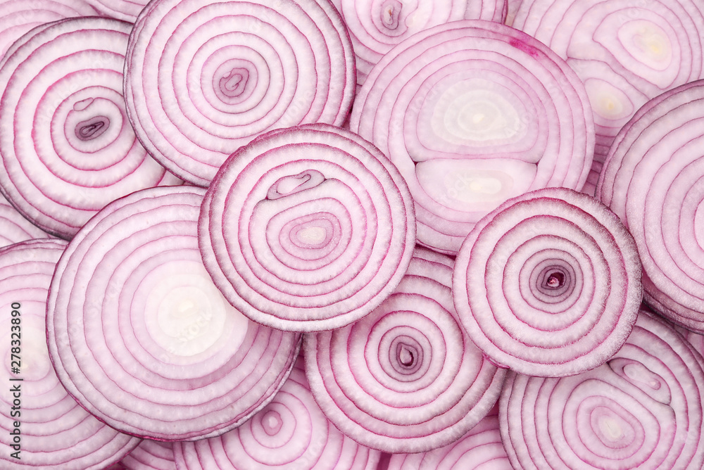 Onion slices as a background. Top view.