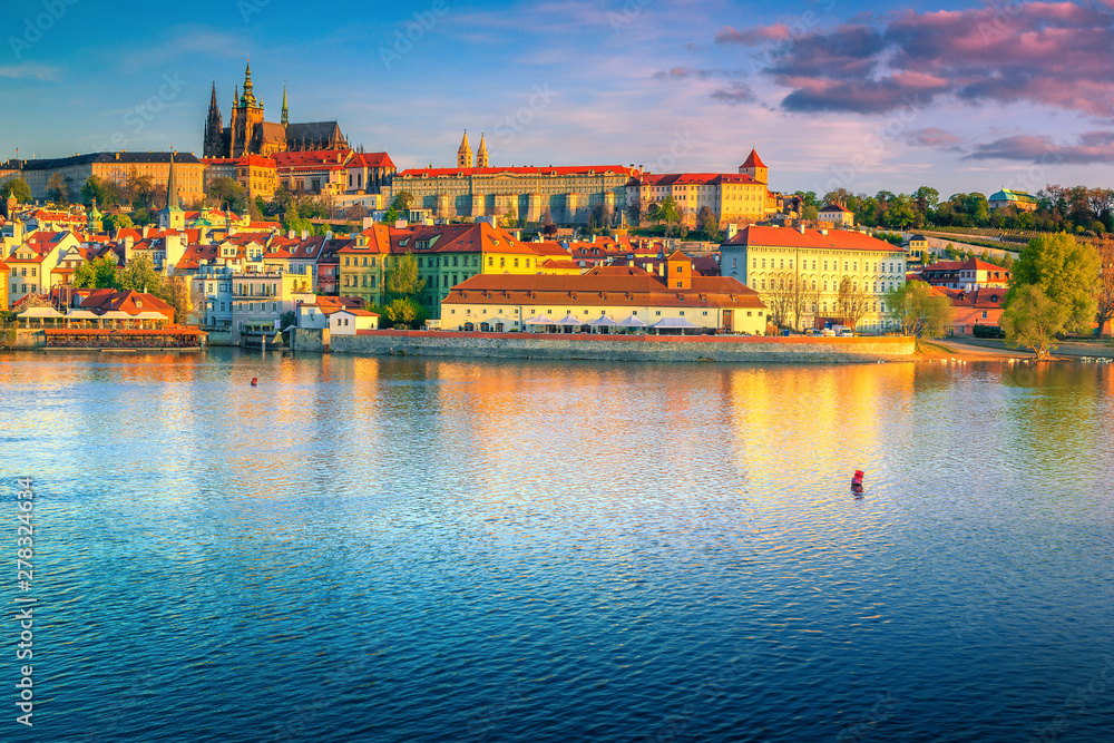 Magical colorful sunrise with historic buildings in Prague, Czech Republic