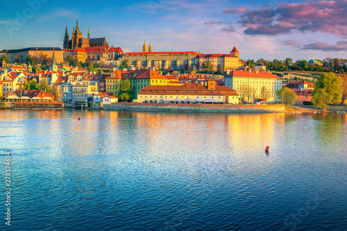 Magical colorful sunrise with historic buildings in Prague, Czech Republic