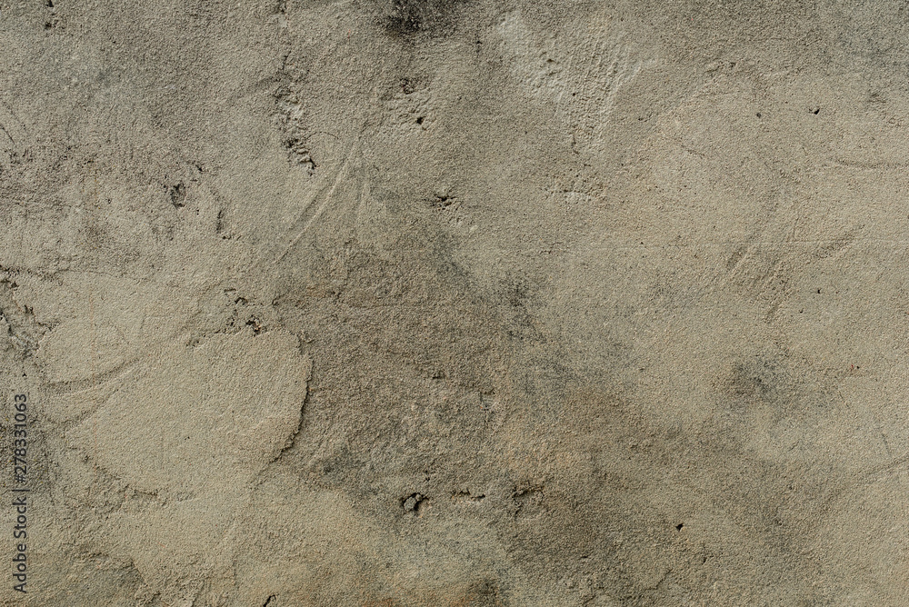 Texture of a concrete wall with cracks and scratches which can be used as a background