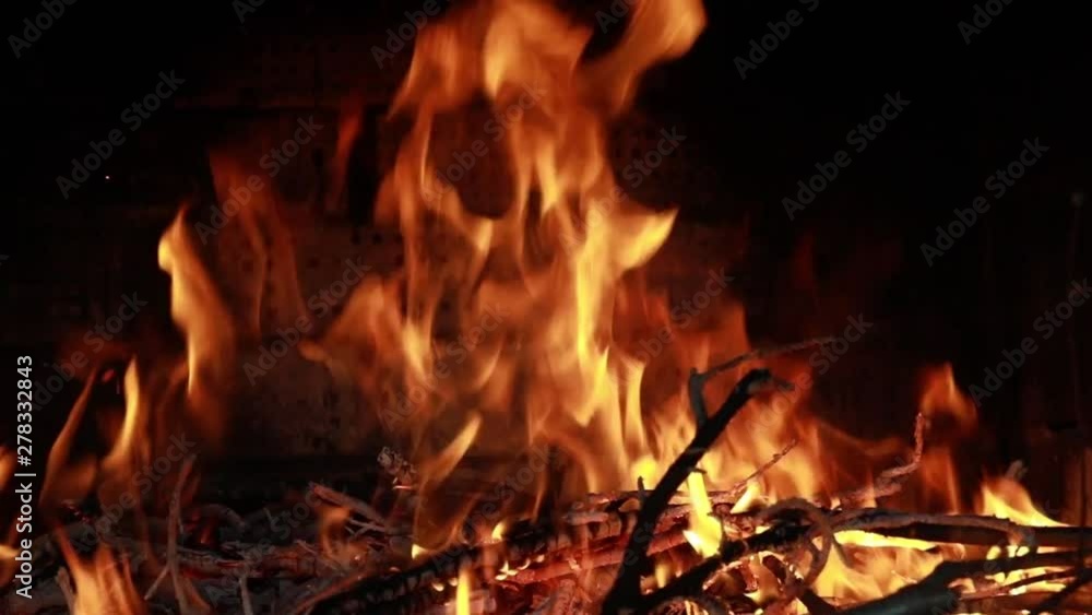 Fire in the fireplace. Bright yellow and red flames Fire in the fireplace. Bright yellow and red flames