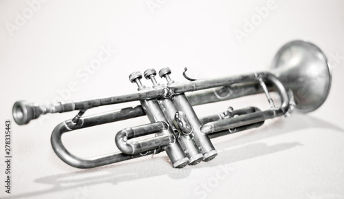 old trumpet isolated on white background